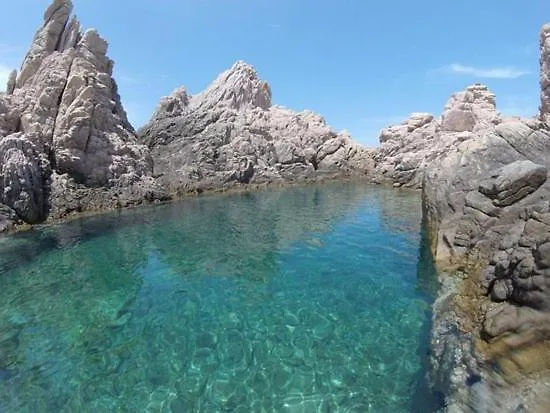 Апартаменты Calarossa Bay